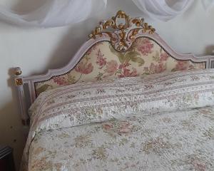 Un pat sau paturi într-o cameră la Posada La Pausa