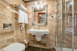 Koupelna v ubytování Hotel Podlasie