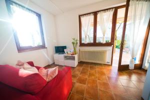 A television and/or entertainment centre at ULIVI Beth's House