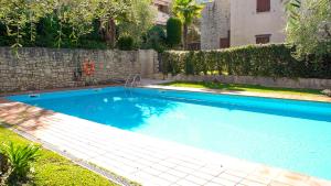 The swimming pool at or close to ULIVI Beth's House
