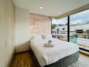 Cama o camas de una habitación en Astonishing 1BR in San Patricio