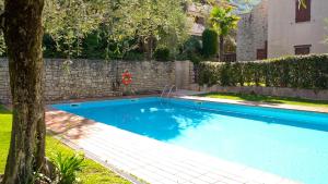 The swimming pool at or close to ULIVI Beth's House