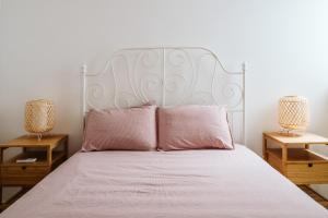 Postel nebo postele na pokoji v ubytování Ta' Tereza Apartment in Gozo