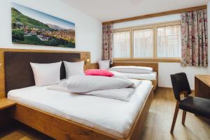 Ένα ή περισσότερα κρεβάτια σε δωμάτιο στο Apart Simala