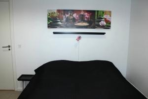 Llit o llits en una habitació de Lothani Luxury Inn
