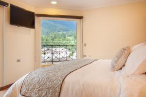 Postel nebo postele na pokoji v ubytování Orígenes Arcabuco Hotel Boutique + 90 fotografií