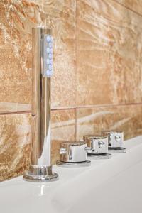 Příslušenství pro přípravu čaje a kávy v ubytování Orígenes Arcabuco Hotel Boutique