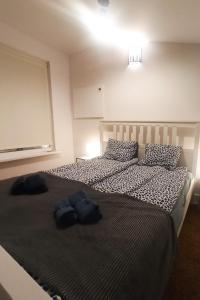 Ένα ή περισσότερα κρεβάτια σε δωμάτιο στο Apartament Magia Dusznik