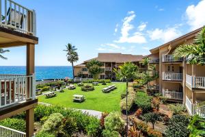 an aerial view of the resort with the ocean in the background at Sea Village #3-203 in Kailua-Kona