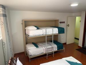 Postel nebo postele na pokoji v ubytování Hotel Lourdes la 62