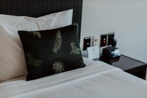 Voodi või voodid majutusasutuse Quest Napier Serviced Apartments toas
