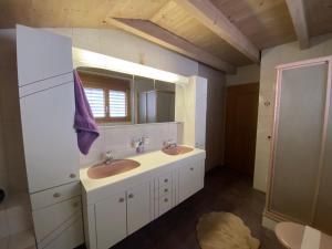 Koupelna v ubytování Haus Wiggis + 28 fotografií
