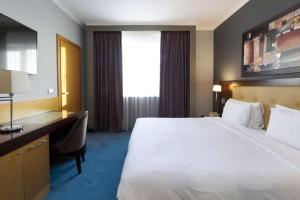 Voodi või voodid majutusasutuse Radisson Hotel Astana toas
