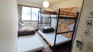 Postel nebo postele na pokoji v ubytování ゲストハウスTSUU小田原 Guest House Tsuu Odawara #OD1 + 37 fotografií