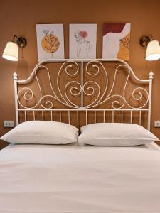 Llit o llits en una habitació de Eden Hotel Bangsean