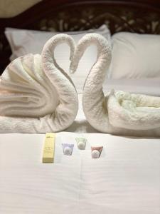 Voodi või voodid majutusasutuse Jawharat Alaqar Inn نزل جوهرة العقر toas