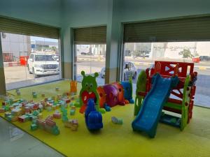 a play room with a bunch of toys on the floor at فندق جمانة ينبع in Yanbu