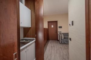 Kuchyň nebo kuchyňský kout v ubytování Hotel Petra