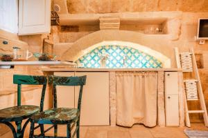 Η κουζίνα ή μικρή κουζίνα στο Casa Monopolina +18 φωτογραφίες