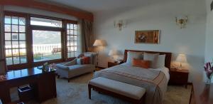 Postel nebo postele na pokoji v ubytování Jaypee Residency Manor