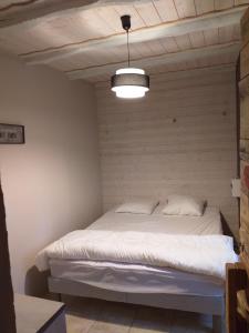 Krevet ili kreveti u jedinici u okviru objekta Maison de vacances 5 chambres
