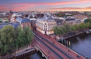 an aerial view of a city with a river at Banks Mansion - All Inclusive Boutique Hotel in Amsterdam
