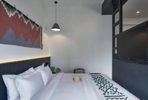 Postel nebo postele na pokoji v ubytování Poshtel VNS