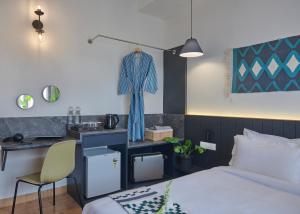 Postel nebo postele na pokoji v ubytování Poshtel VNS