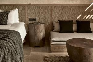 A bed or beds in a room at Olea All Suite Hotel, a Member of Design Hotels