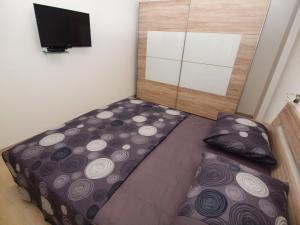 Postel nebo postele na pokoji v ubytování Apartments Karlo