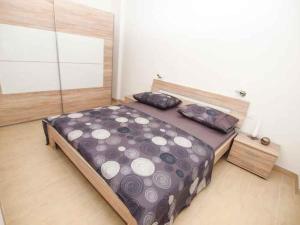 Postel nebo postele na pokoji v ubytování Apartments Karlo