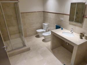 Kúpeľňa v ubytovaní El Casar Apartments