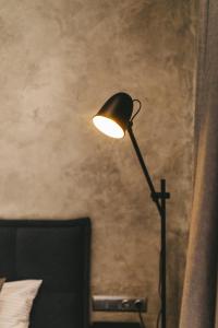 Кровать или кровати в номере NUDE Просторі апартаменти біля історичного центру вул.Збаразька +25 фотографий