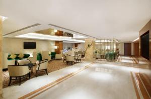 Телевизор и/или развлекательный центр в Holiday Inn Dhaka City Centre by IHG