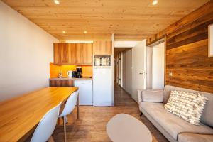 O bucătărie sau chicinetă la Appartement pour 5 - résidence avec piscine et spa
