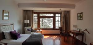 Posezení v ubytování Jaypee Residency Manor