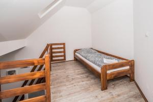 Rúm í herbergi á Hotel Na Baste