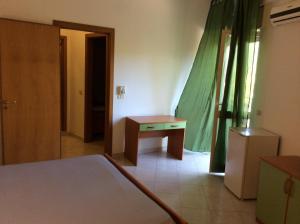 Postel nebo postele na pokoji v ubytování Hotel Eden