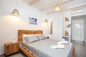 Posteľ alebo postele v izbe v ubytovaní Muses Hotel