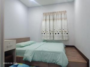 Postel nebo postele na pokoji v ubytování Sekinchan Paddy via Seaview Home 高楼 看海 稻田 民宿