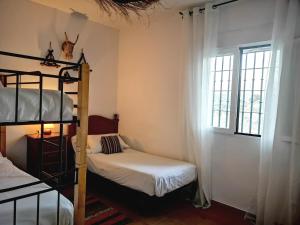 Postel nebo postele na pokoji v ubytování Finca Pil - Casa rural con piscina