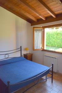 Postel nebo postele na pokoji v ubytování Villa Manu
