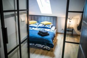 Posteľ alebo postele v izbe v ubytovaní Loft 33