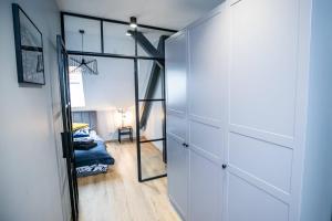 Posteľ alebo postele v izbe v ubytovaní Loft 33