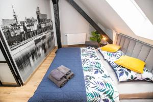 Posteľ alebo postele v izbe v ubytovaní Loft 33