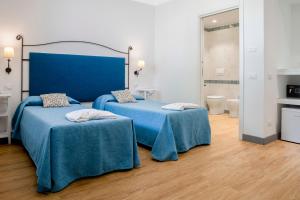 Postel nebo postele na pokoji v ubytování Le Dune Sicily Hotel