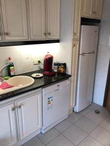 Kuchyň nebo kuchyňský kout v ubytování Calafell Residencial