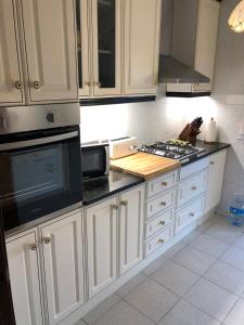 Kuchyň nebo kuchyňský kout v ubytování Calafell Residencial