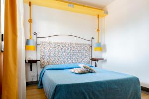 Postel nebo postele na pokoji v ubytování Le Dune Sicily Hotel