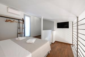 Кровать или кровати в номере AG Luxury Villas, Iraklitsa